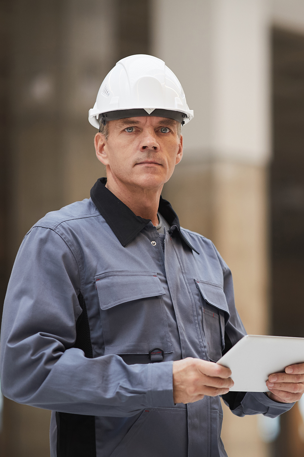 mature_construction_worker_holding_tablet_2021_09_24_04_10_46_utc.jpg